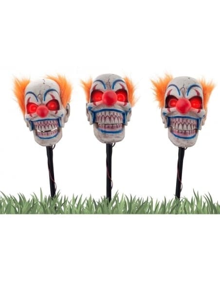 Décoration Effrayante pour Halloween : Têtes de Clown Terrifiantes pour un Jardin Hanté