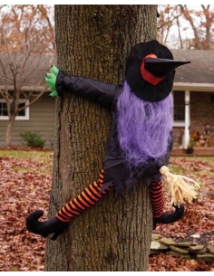Sorcière volante écrasée contre un arbre : déco rigolote halloween