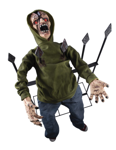 Automate Halloween de zombie empalé dans une grille métallique