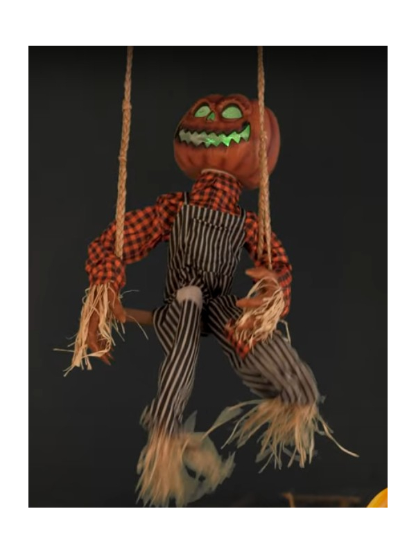 Citrouille épouvantail animée sur balançoire Halloween