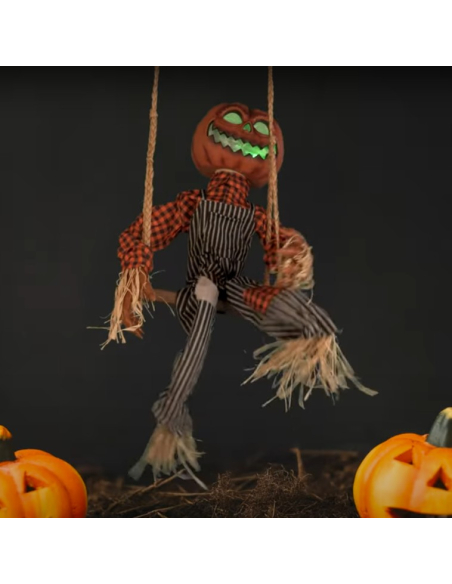 Citrouille épouvantail animée sur balançoire Halloween
