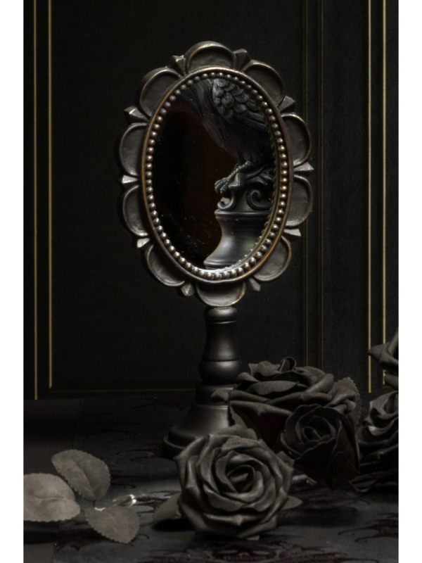Miroir ovale noir sur pied avec cadre à perles décoratives