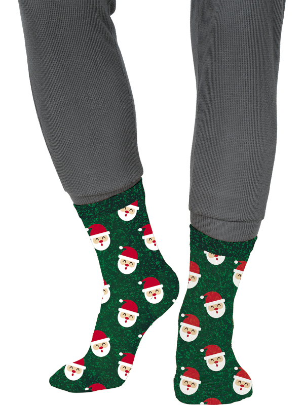 Chaussettes de Noël enfant vertes à motifs Père Noël