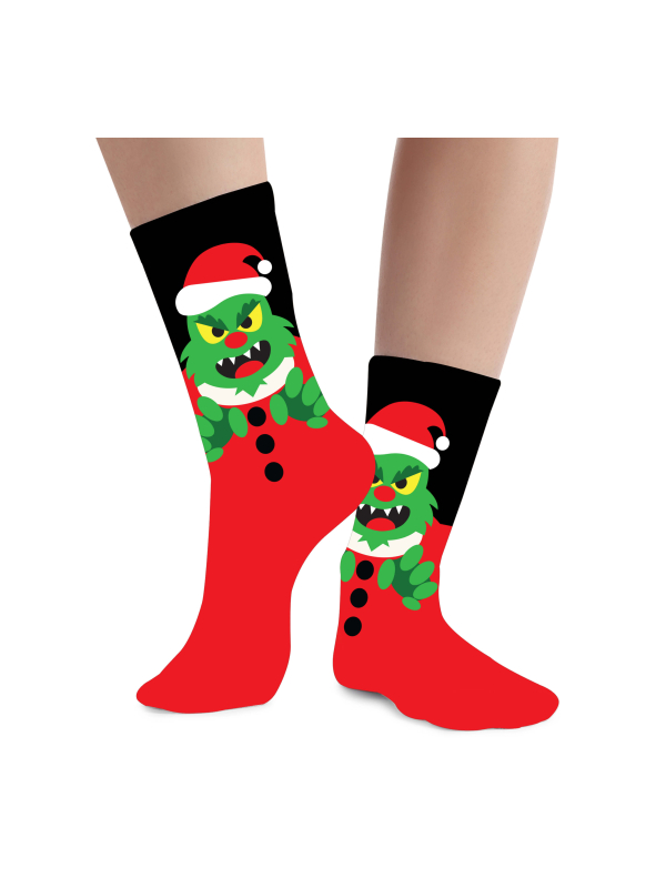 Chaussettes de Noël enfant monstre vert avec bonnet rouge