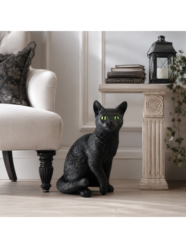 Sculpture de chat noir en résine aux yeux verts
