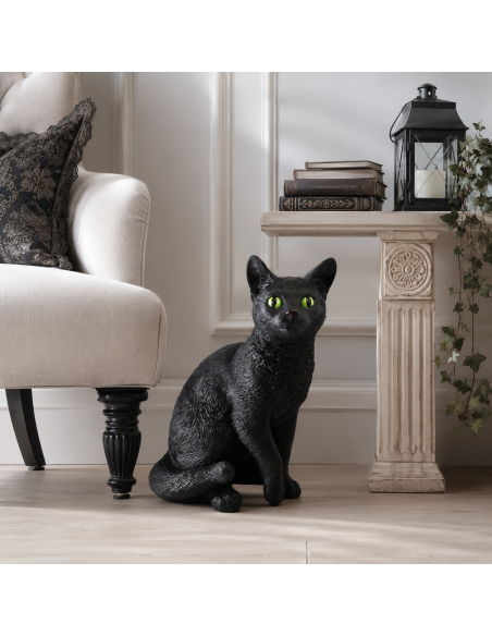 Sculpture de chat noir en résine aux yeux verts