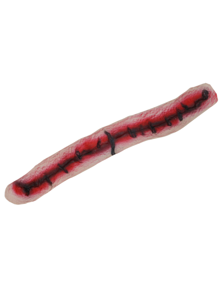 Détail de cicatrice cousue en latex avec fils noirs